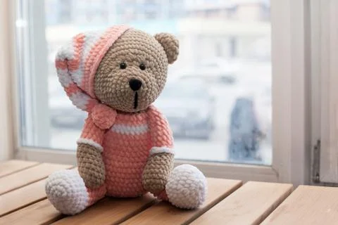 Teddybear toy knitted in the technique of knitting amigurumi Stock Photos
