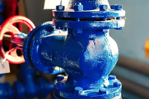 Tee gas pipe large diameter close-up. Industrial background. Stock Photos