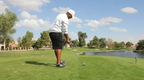 Teeing off 5 iron Stock Footage 14928359