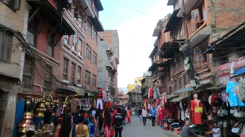 Teej celebrations while walking down Mangal Bazaar near Patan Durbar Square Stock Footage 206038319