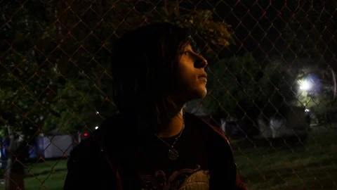 Teen alone at park Stock Footage 80274124