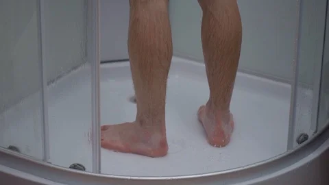 Teen boy bathing under shower | Stock Video 