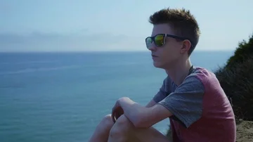 Teen Boy Enjoys Ocean View Seagulls Fly by Malibu Stock Footage