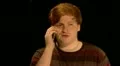 Teen boy gets funny gossip phone call HD Footage