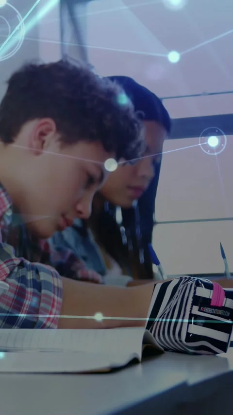 Teen boy taking notes in class, phone tap causing camera pan, network overlay Stock Footage 331337163