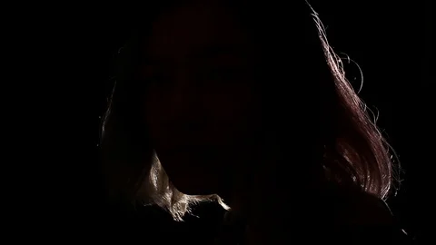 Teen in the dark Stock Footage 121436731