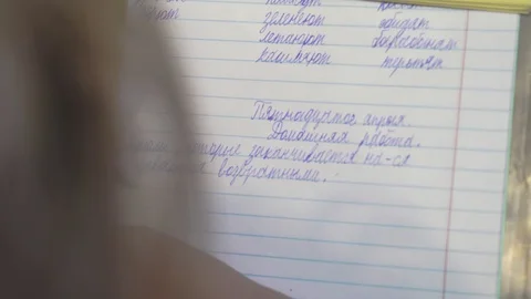 Teen does lessons in Russian Stock Footage 128497434