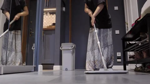 Teen Doing Entryway Chore With Flat Mop Stock-Footage 335589986