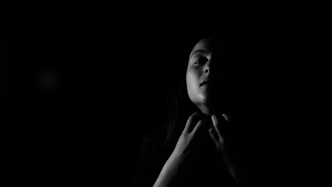 Teen frantically pulls off mask Stock Footage 79707254
