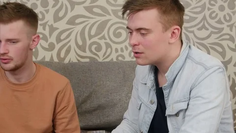 Teen friends having an argument and looking irritated Stock Footage