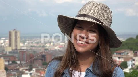 Teen Girl Having Fun Wearing Hat Stock Photos