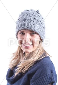 Teen Girl With Knit Hat And Cardigan
