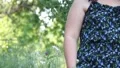 teen girl smelling flowers 8041 HD Footage