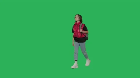 Teen girl walking on Green Screen | Stock Video | Pond5