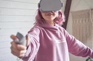 Teen Girl Wear Vr Goggles Hold Controller Playing Virtual Reality Game. Stock Photos