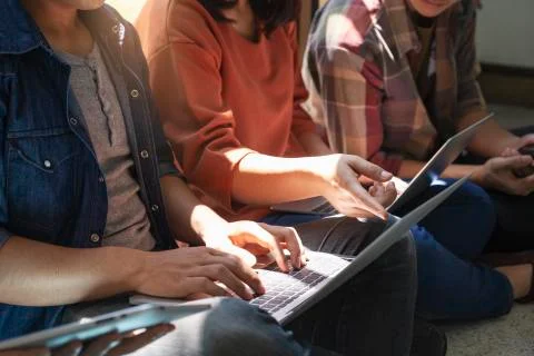 Teen group using computer and tablet to learning online. Stock Photos