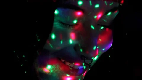 Teen having fun with lights Stock Footage 80824006