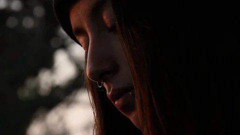 Teen looking down, doing something Stock Footage 101877125