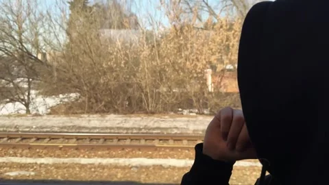 Teen Looking Out Train Window Footage During Journey 스톡 동영상 334126456