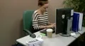 Teen office worker answering a call HD Footage
