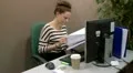 Teen office worker checking files 1 HD Footage