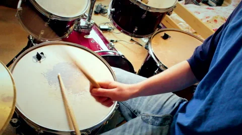 Teen playing drums Stock Footage 47623418