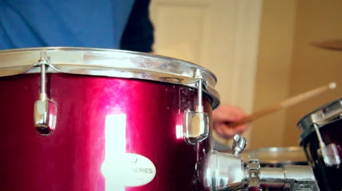 Teen playing drums Stock Footage 47624715
