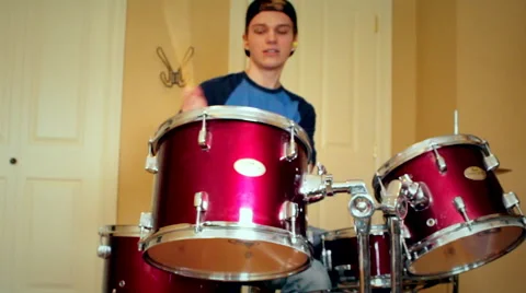Teen playing drums Stock Footage 47625268