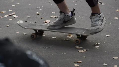 Teen on skateboard performs a tricks Stock Footage 280297652
