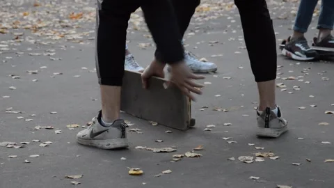 Teen on skateboard performs a tricks Stock Footage 280304364