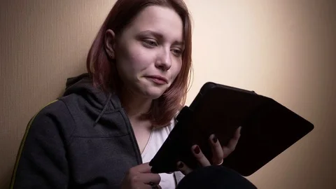 Teen student with ebook reader Stock Footage