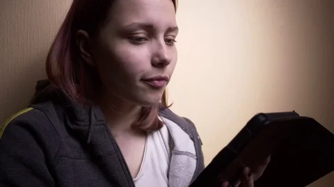 Teen student with ebook reader Stock Footage 76150324