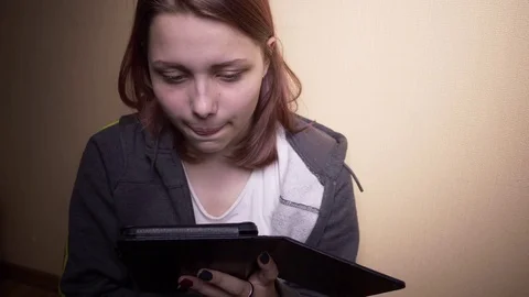 Teen student with ebook reader Stock Footage 76150364