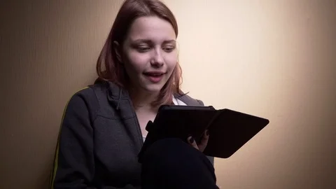 Teen student with ebook reader Stock Footage 76150388