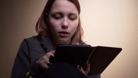 Teen student with ebook reader Stock Footage 76150444