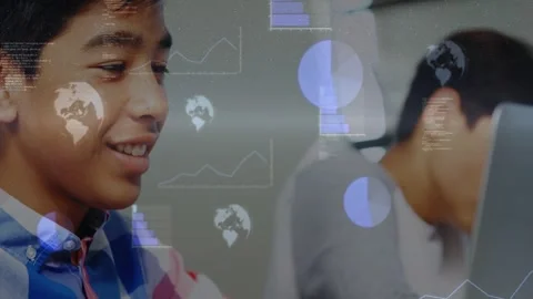 Teen student typing laptop, causing animated charts and code to appear over Video stock 329870925