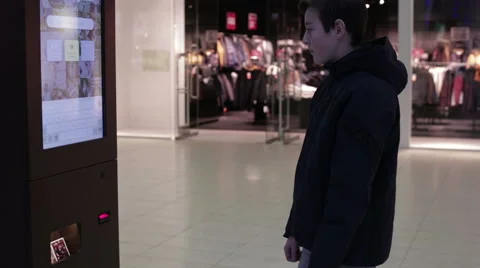 Teen takes a printed photo Stock Footage 59556510