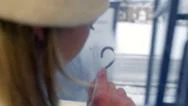 Teen On Train, Blows Hot Air On Cold Window, Then Draws A Heart With Her Finger Stock Footage