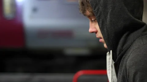 Teen waiting at Train Platform Stock Footage 40678881