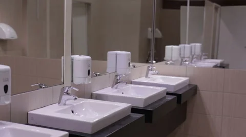 Teen washes his hands with soap in the sink Video stock 59557805