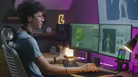 Teenage 3D designer develops video game, creates character or clothes Stock Footage 244453393