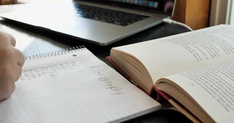 Teenage boy does school work at home. Stock Footage 141231216