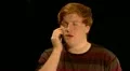 Teenage boy gets funny gossip phone call HD Footage