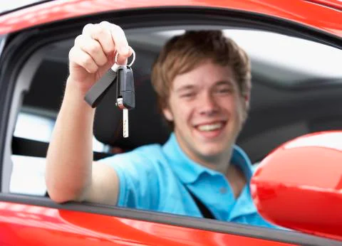 Teenage Boy Sitting In Car Holding Car Keys Stock Photos