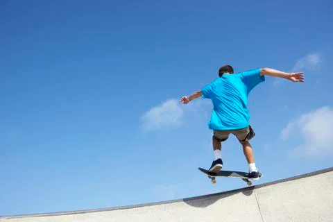 Teenage boy in skateboard park Stock Photos