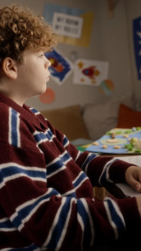 Teenage Boy Using Desktop Computer for Online Tutoring at Home Stock Footage 347143343