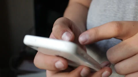 Teenage Boy Using iPhone Smartphone Device Stock Video Video stock 37345847