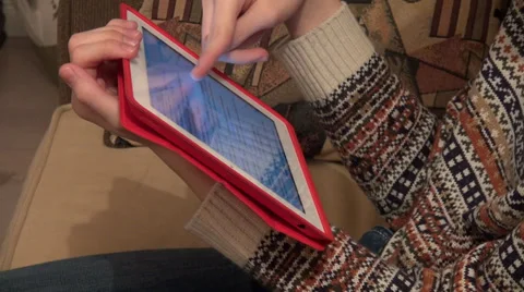 Teenage boy working with a tablet computer at home, checking email Stock Footage 33795838