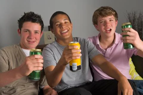 Teenage boys drinking beer Stock Photos