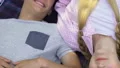 Teenage couple lying on coverlet outdoors, innocent first love, friendship HD Footage